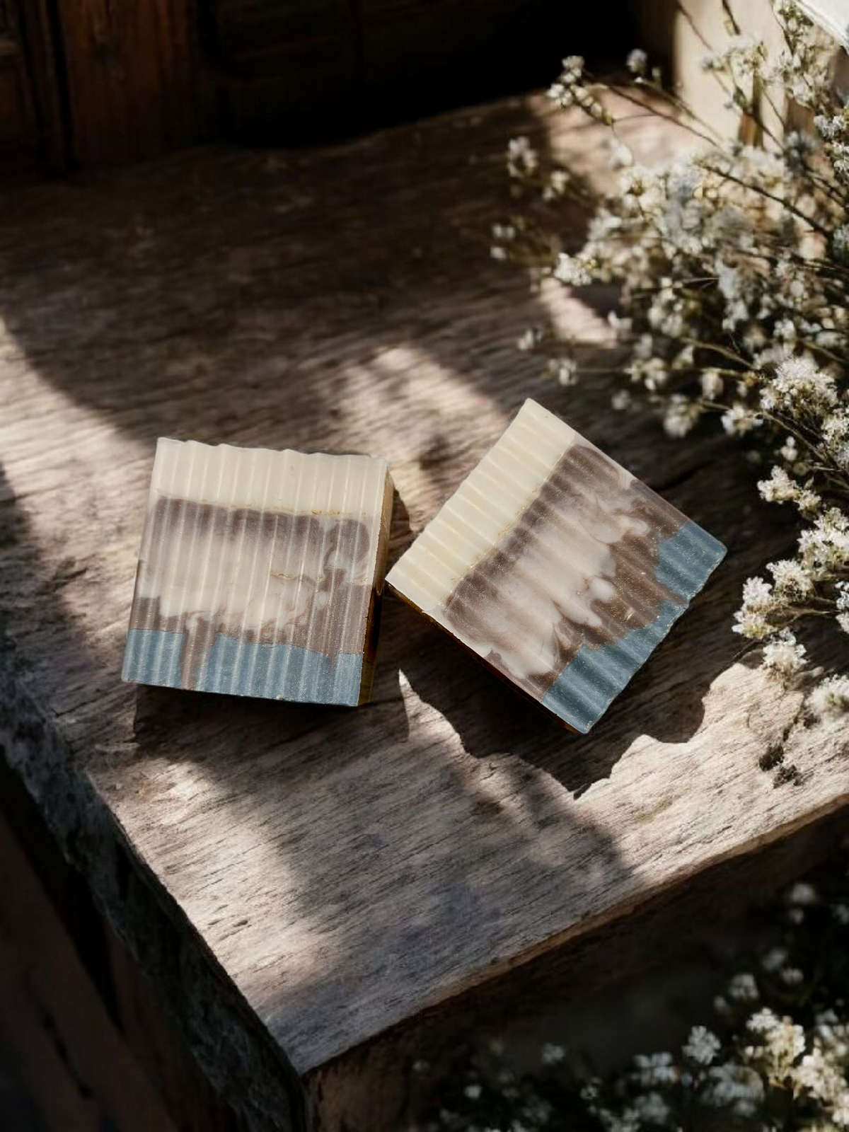 27 Oatmilk and Aloe Soap on a rustic wooden surface